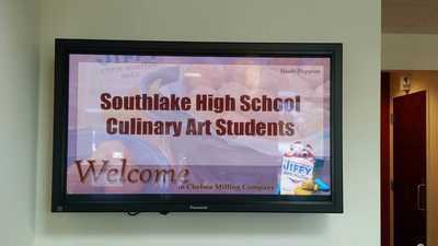 Picture of welcome to Southlake on tv monitor.