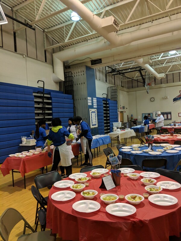 student chefs setting up tables