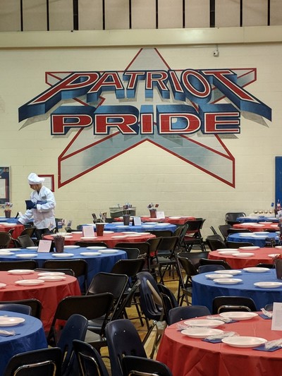 Patriot Pride logo in gym.