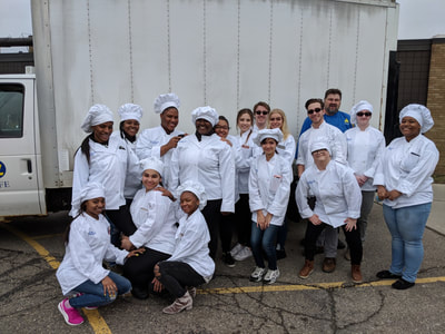 Group picture of all student chefs and Chef Shepherd.