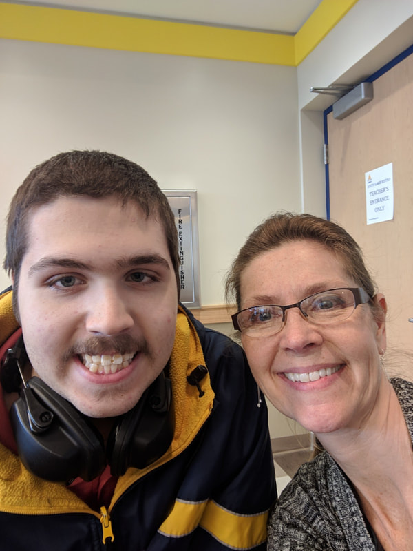 Lake Shore student posing for a selfie with his mom, Ms. Marsha!
