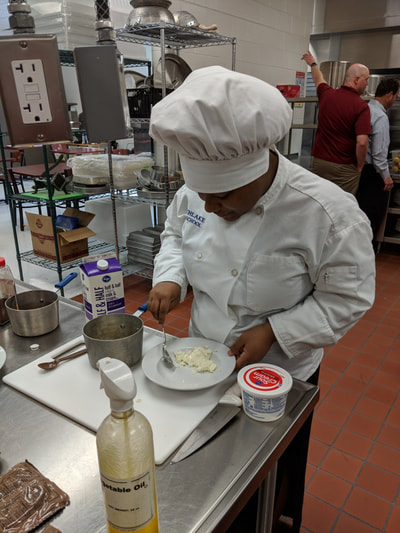 Student creating their entree.
