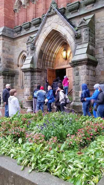 Students entering St. Anne's Church to learn about Day of Dead. 