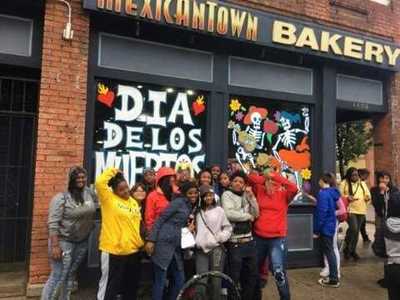 Students outside of Mexicantown Bakery. 