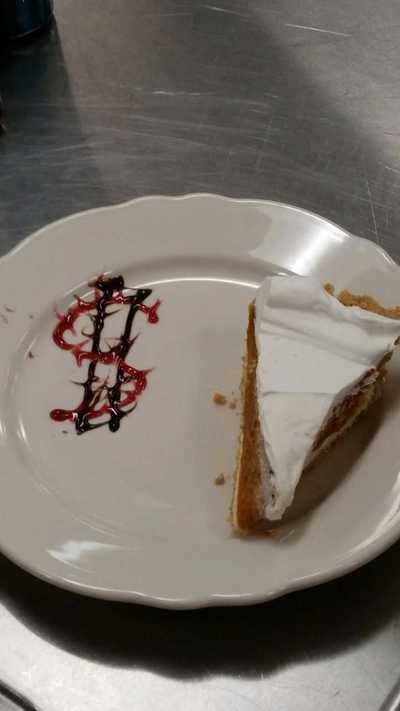 Dollar sign cake plating idea with a slice of pie - foods class