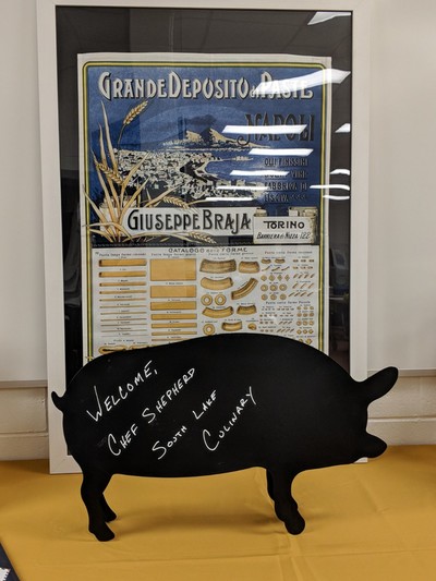 Black pig with welcome written on it 
