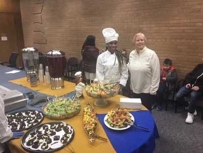 student chef with Candice Miller, Public Works Commissioner