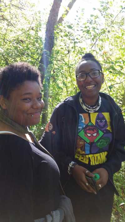 Two students on the trail at Yates Cider Mill.
